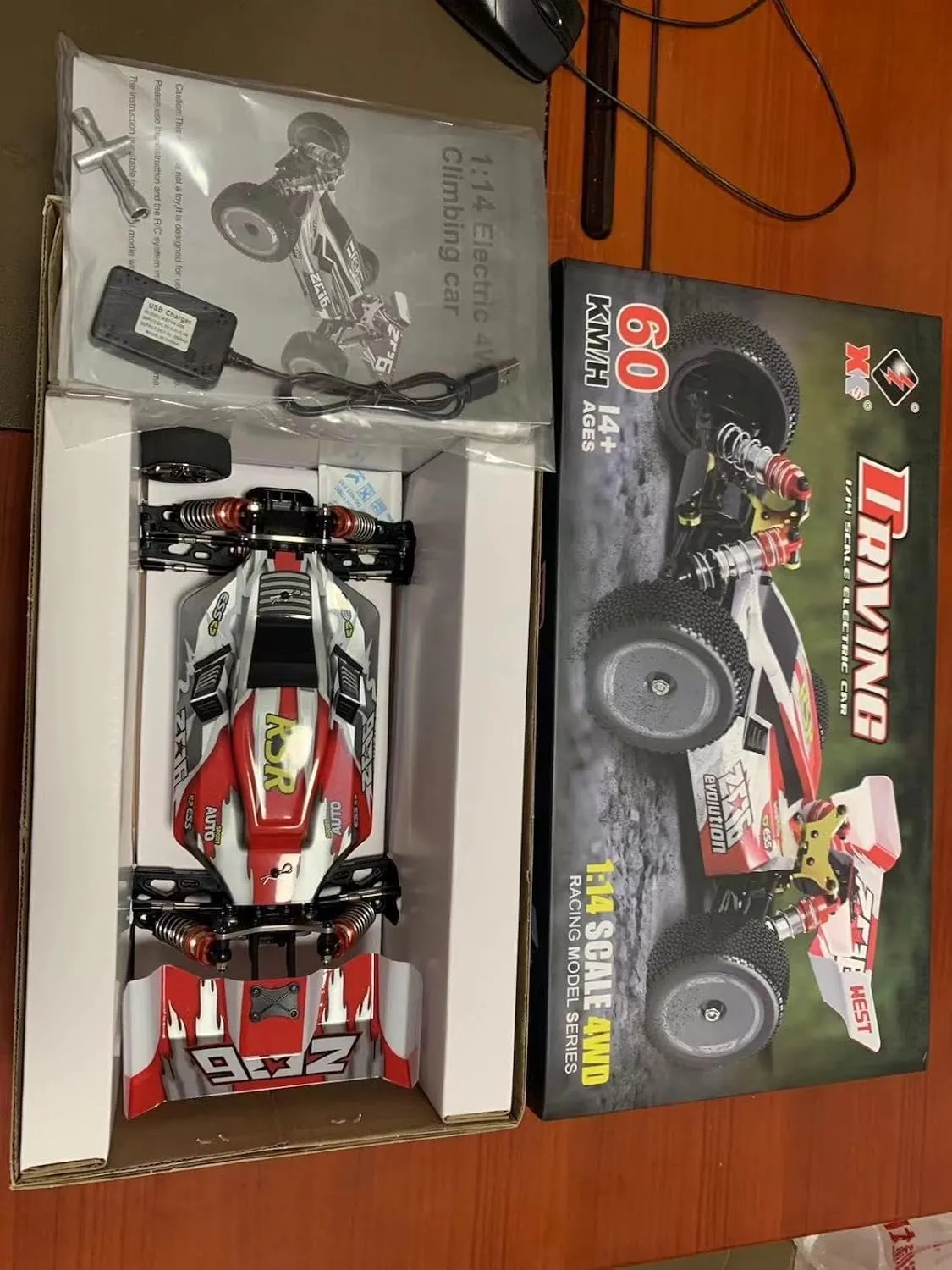 WLtoys 144001 1:14 60KM/H 2.4G RC Car 4WD Electric High Speed Off-Road Remote Control Racing Drift Toys Car 1/14 for Children (144001 2 * 1500)